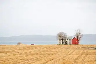 A farm in the characteristic flat landscape of Ørland