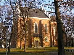 Brick Gothic St. Bartholomew Church (14th–16th centuries) and its bell tower