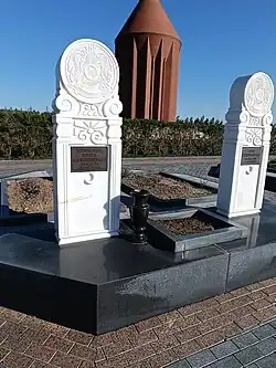 Gravestone of Abish Kekilbayev and his wife