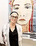 Ukrainian-American painter Ola Rondiak at the opening of an exhibition "Metamorphosis"
