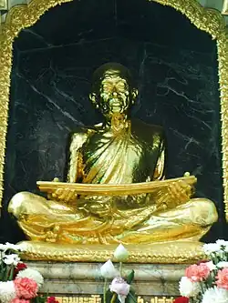 A statue of Ariyavangsagatayana (Sa Pussadeva), the first abbot of this temple