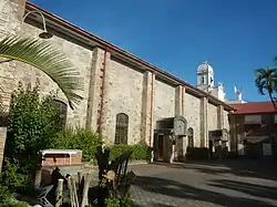 Exterior wall featuring buttresses