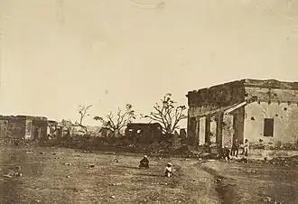 Photograph entitled, "The Hospital in General Wheeler's entrenchment, Cawnpore". (1858) The hospital was the site of the first major loss of British lives in Cawnpore