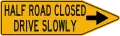 Half road closed, drive slowly