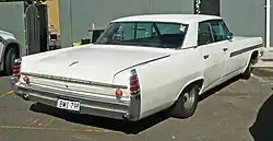 1963 Pontiac Parisienne Sport Sedan (Australia). Rear trim is similar to U.S. Catalina, while front trim is close to the Bonneville. Note amber turn lenses and right-hand drive to conform to Australian safety standards.