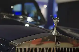 Front grille (top) of a 1972 Silver Shadow, showing Rolls-Royce's trademark bonnet mascot, and the double R logo below it
