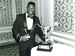 Chris Howard (Air Force) with the trophy in 1990