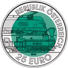 Coin with a dark green center and a silvery outer rim. The rim reads: Republik Österreich 25 Euro. The centere shows electric and a steam driven locomotive