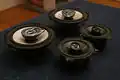 A set of speaker drivers removed from a passenger vehicle