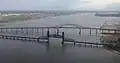 Aerial view with the Upper Bay Bridge in the foreground