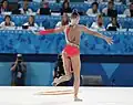 Rotating the hoop around a leg (Yulia Vodopyanova)
