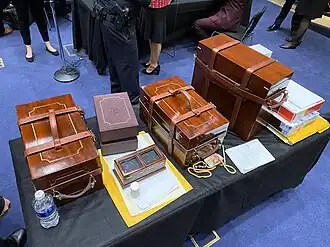 A table with brown boxes.