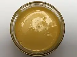 An open jar of Cheez Whiz