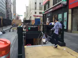 Relocated northeastern corner entrance, with construction of the elevator in the background