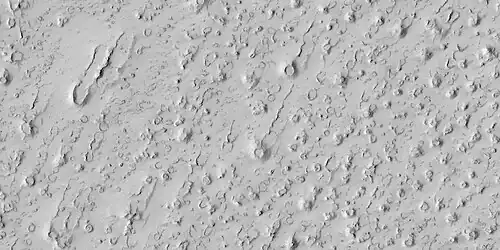 Close view of rootless cones with tails that suggest lava was moving toward the Southwest over ice-rich ground, as seen by HiRISE under HiWish program