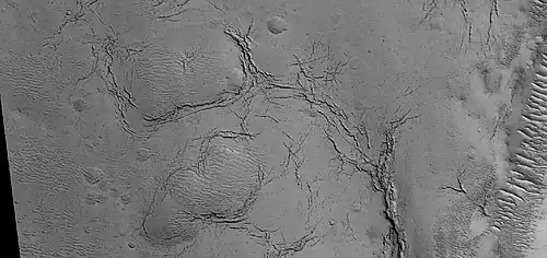 Close view of cracks on crater floor, as seen by HiRISE under HiWish program