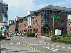 Asda's Headquarters, Asda House in Leeds; Asda was the UK's second largest supermarket until 2014, and is now third; Asda turned over £23.3 billion in 2015, and is the region's largest company