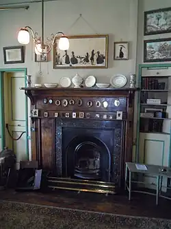 A fireplace in a reception room