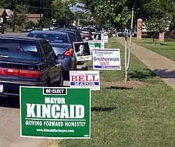 A row of yard signs