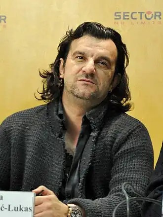 Lukas at a press conference in 2011