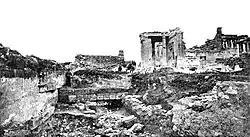 Acropolis excavation pit where remains of Archaic statues were found, northwest of the Erechtheum