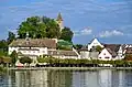 Endingerhorn fortification and medieval town hall at the Einsiedlerhaus building, as seen from ZSG paddle steamer Stadt Rapperswil