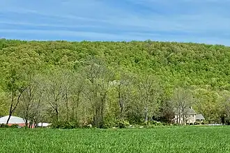Area view of the farm in the South Branch Raritan River valley, Schooley's Mountain in the background