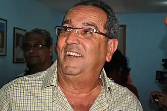 Headshot of Alemán in an indoors environment