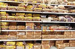 Photo of sliced brown bread loaves on the shelves in Asda, Bristol