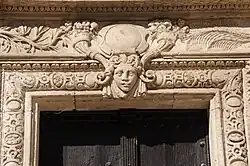 Assézat: carved lintel with horns of plenty.