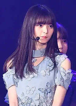 Asuka Saitō with Nogizaka46 at a 2019 concert for the KKBOX Music Awards in Taiwan
