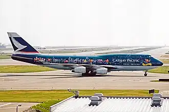 A Boeing 747-400 (B-HOX) in The Spirit of Hong Kong Millenium special livery