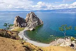 Image 71The Shamanka Шаманка [ru], a holy rock in Shamanism and one of the 9 most holy places in Asia, on the westcoast of Olkhon (from List of islands of Russia)