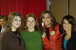 BarlowGirl with fan (from left to right: Lauren, fan, Rebecca and Alyssa).