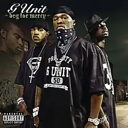 A photo of 50 Cent standing in the middle of a street at nighttime, with Lloyd Banks and Young Buck standing behind him. All three are wearing black T-shirts and jewellery. Behind them on the left side is a building with a photo of Tony Yayo projected on it. In the top left corner is the G-Unit logo, with the album's title placed below it.