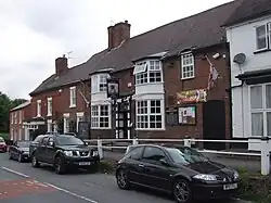 Belbroughton Workmen's Club and High Street in 2010
