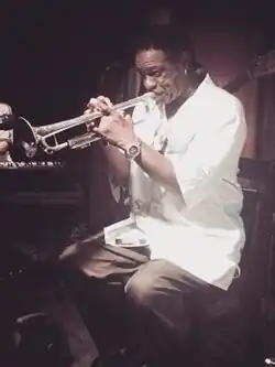 Cauley performing in 2015