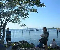 Gravesend Bay as viewed from the shoreline in Gravesend, Brooklyn. The Verrazzano-Narrows Bridge is viewable in the background.