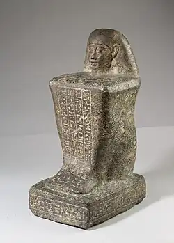 Block statue of the god's father Pameniuwedja, son of Nesmin and Nestefnut; 4th century BC; height: 34.6 cm (13.6 in), width: 14.5 cm (5.7 in), depth: 19.1 cm (7.5 in); Metropolitan Museum of Art