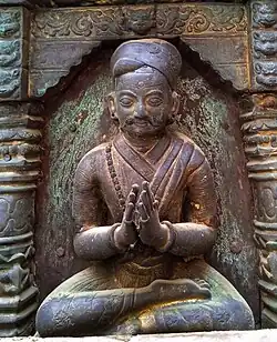 Posthumous gilded sculpture of Jitamitra Malla consecrated by his wife, Lālamati.[6]