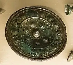 A bronze phalera found in Hořovičky, National Museum (Prague).: 122