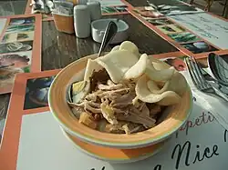 Bubur ayam served in Solo, Central Java.