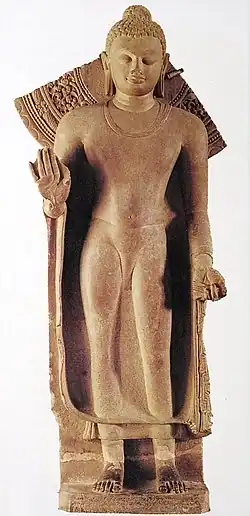 Buddha, standing, inscribed: "Gift of Abhayamira in 154 GE" (474 CE) in the reign of Kumaragupta II. Sarnath Museum.[57]