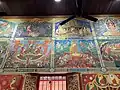 Murals in the Ubosot depicting the Buddha's life