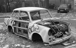 Junked, vandalised car
