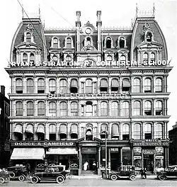 Historical campus building in Providence, RI with old Bryant & Stratton Commercial School sign.