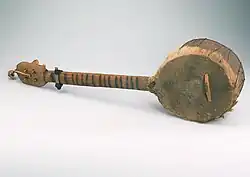 Ramkie. Rhodesia-Zambia, skin topped lute or banjo, metal can for body, Kaonde culture