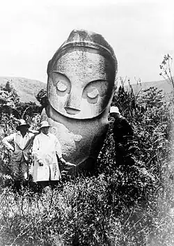 Watu Molindo ("the entertainer stone"), one of the megaliths in Bada Valley, Central Sulawesi, Indonesia, usually found near megalithic stone vats known as kalamba.[218]