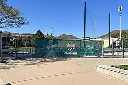 Signage announcing the construction zone for Cal Poly's upcoming John Madden Football Center is shown at the San Luis Obispo campus in May 2023.