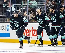 A group of Seattle Kraken ice hockey players